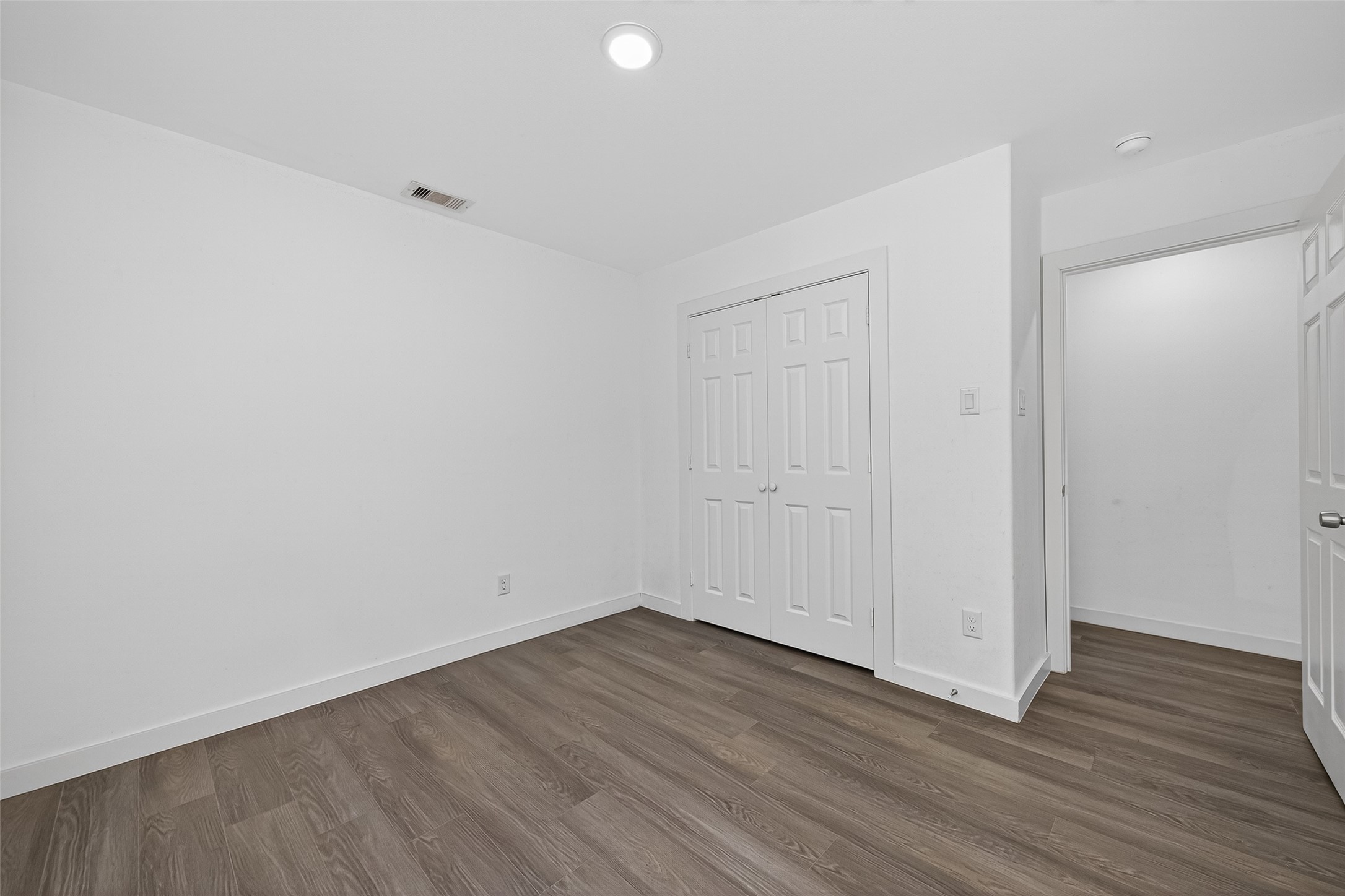 9405 Madera Road Houston, TX 77078 - Photo 14 of 32 a view of a room with wooden floor