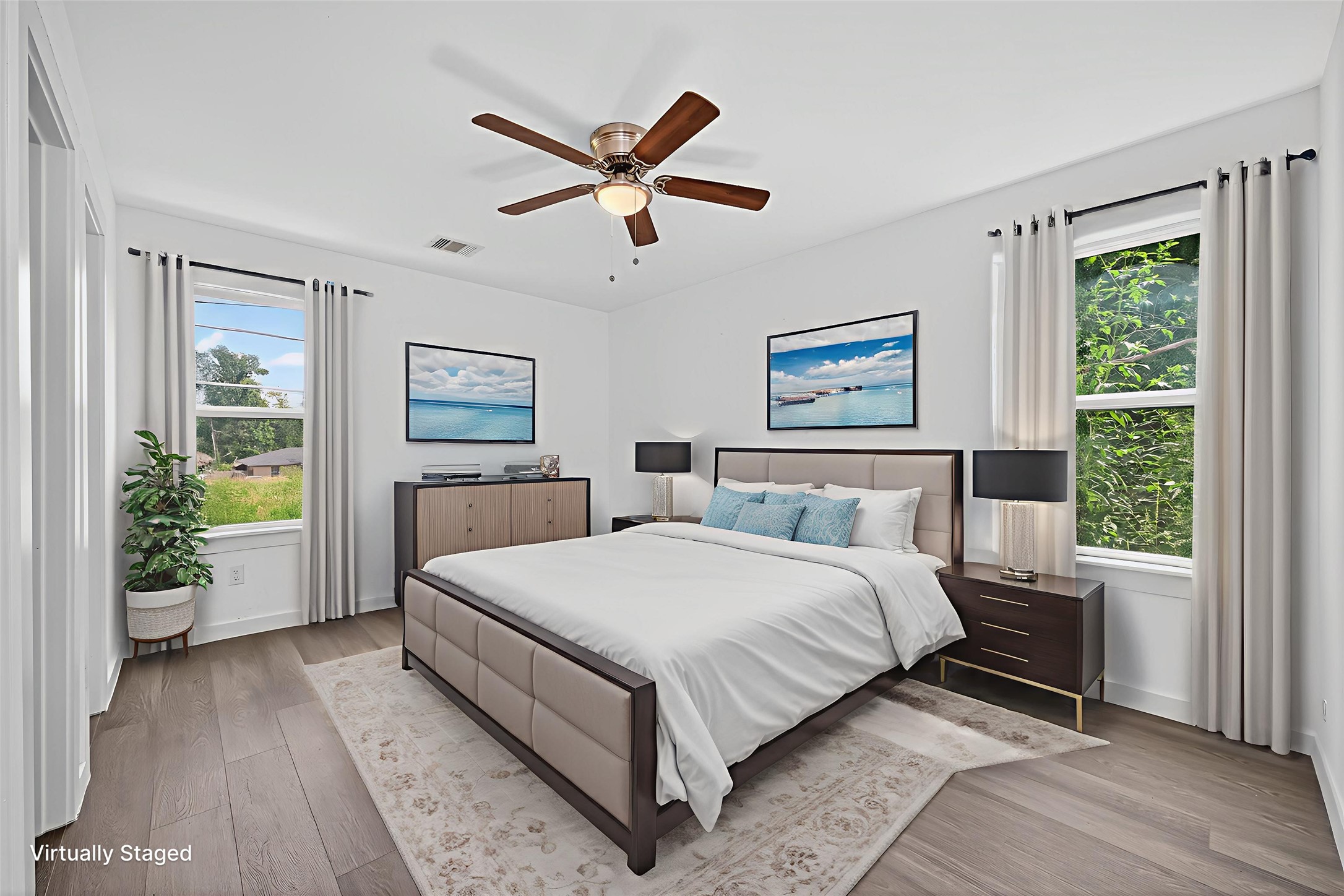 9405 Madera Road Houston, TX 77078 - Photo 16 of 32 a large bed sitting in a bedroom next to a window