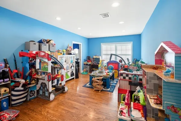 a view of a play room with toys and toys