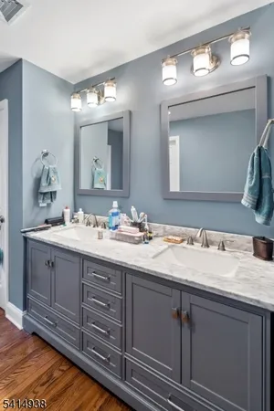 a bed room with a bed and a tv