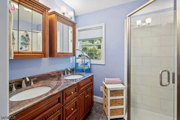 a picture of a bench in front of a building