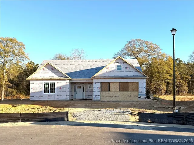 a front view of a house with a porch