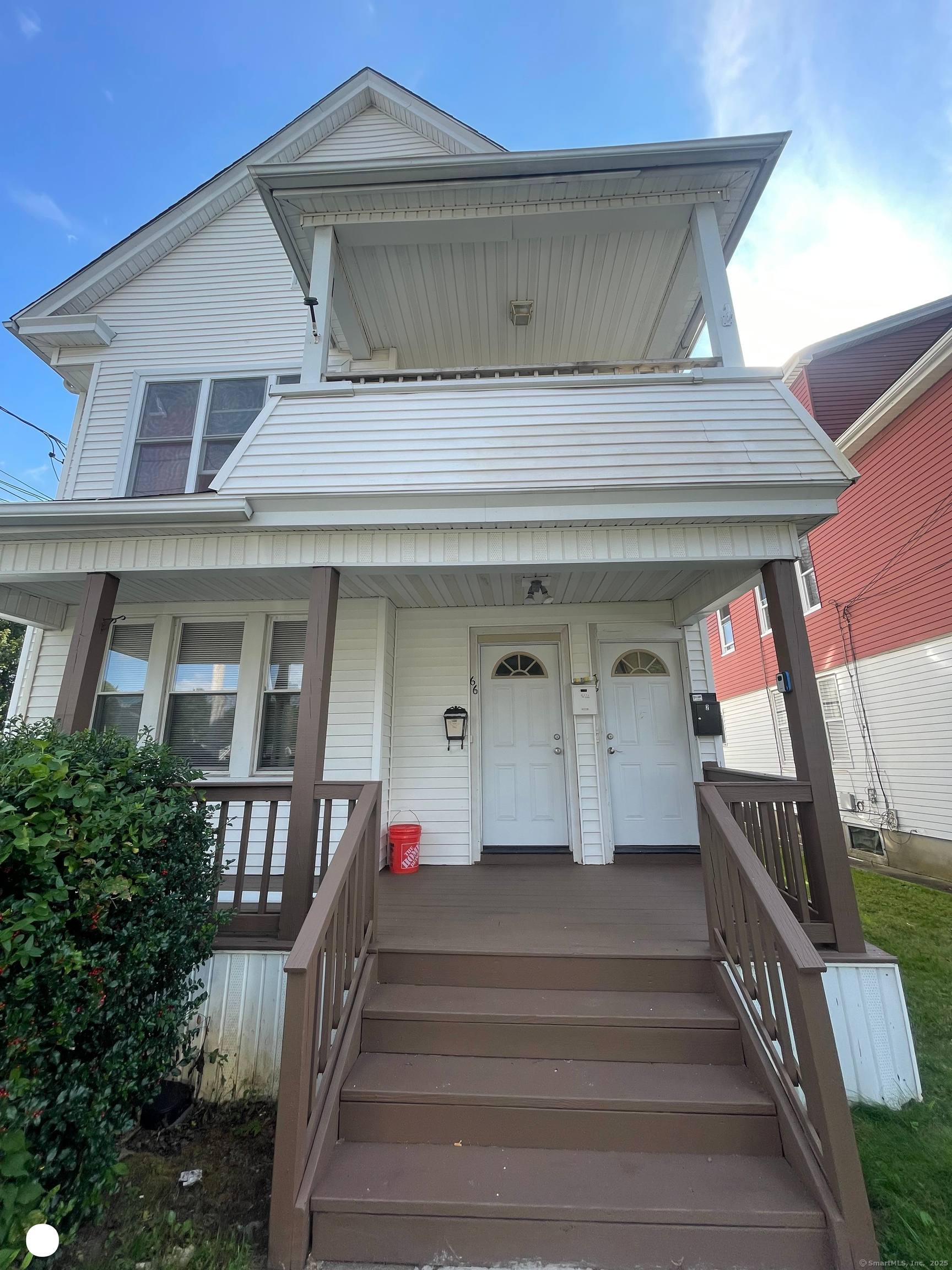 66 Church Street Hamden, CT 06514 - Photo 1 of 1 a view of a house with a staircase