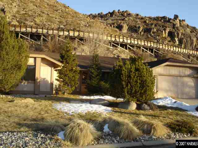 265 Cliff View Court Reno, NV 89523 - Photo 1 of 6 a view of a house with a snow in the yard