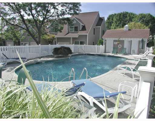 193 Hamilton Avenue, Unit 10 Greenwich, CT 06830 - Photo 19 of 22 a view of a house with backyard