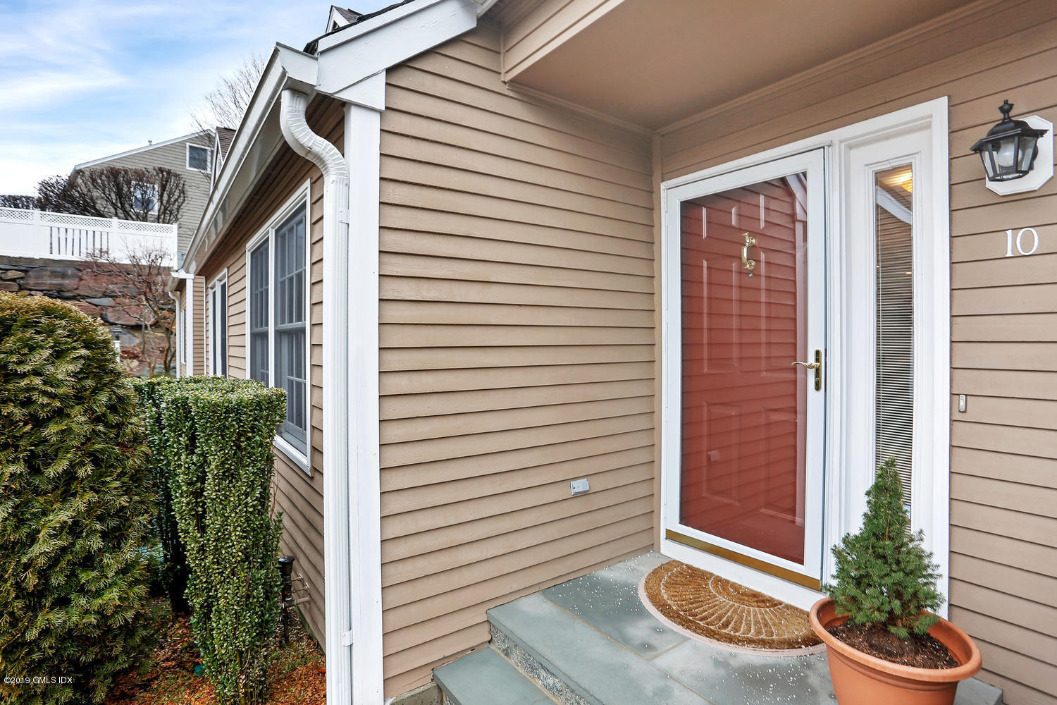 193 Hamilton Avenue, Unit 10 Greenwich, CT 06830 - Photo 2 of 22 a view of outdoor space and porch