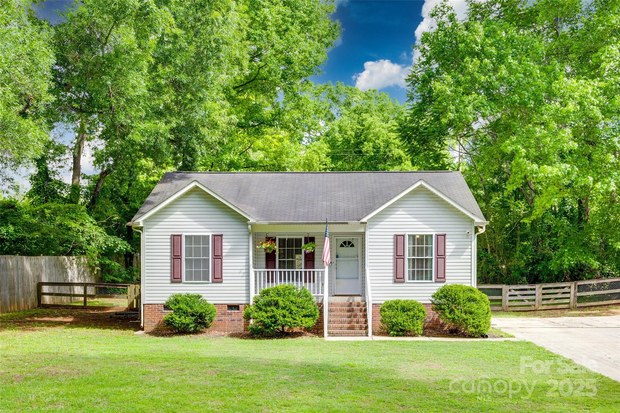 110 8th Street York, SC 29745 - Photo 1 of 26 a view of a house with garden and plants