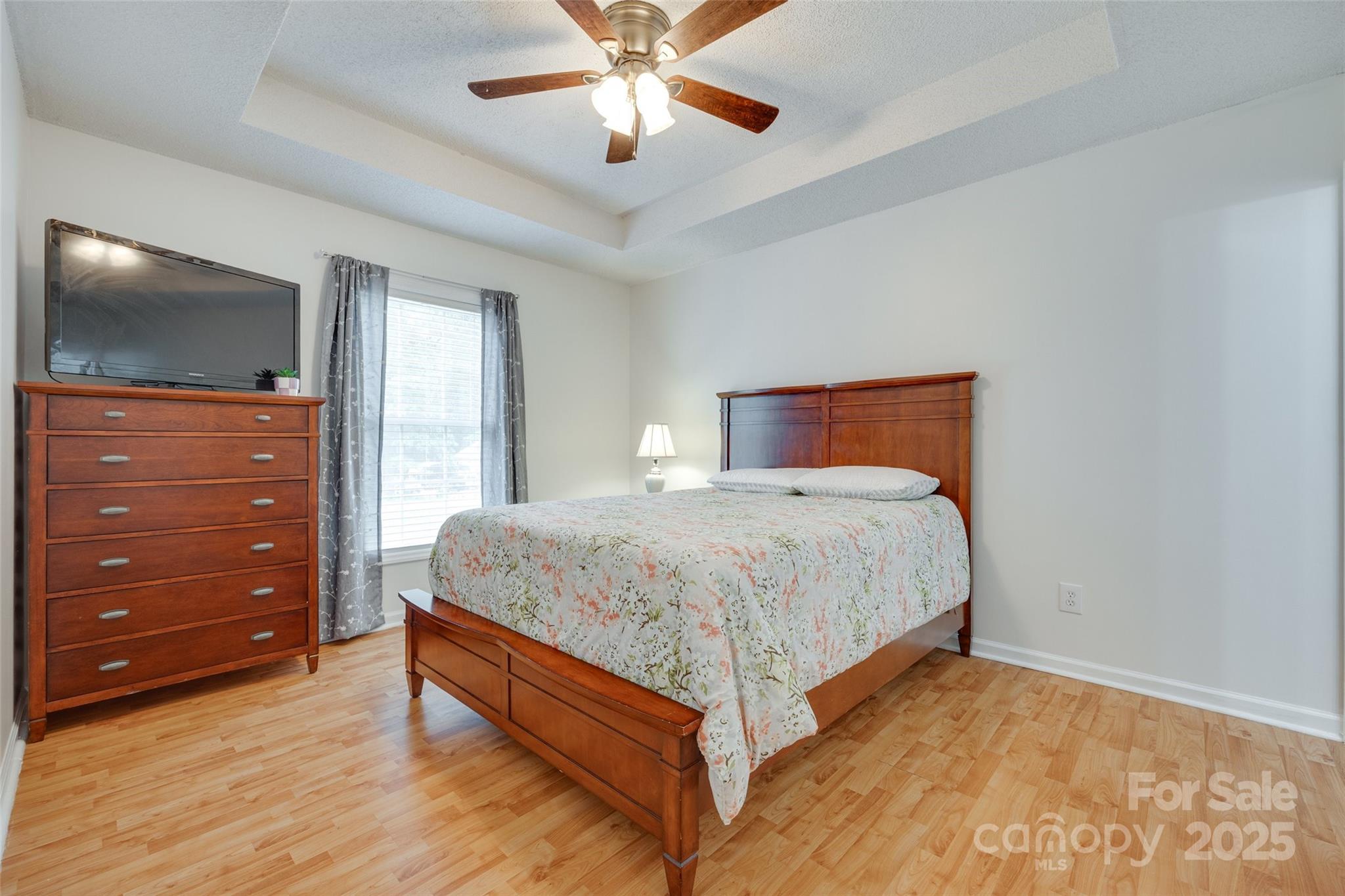 110 8th Street York, SC 29745 - Photo 12 of 26 a bedroom with a bed and a dresser