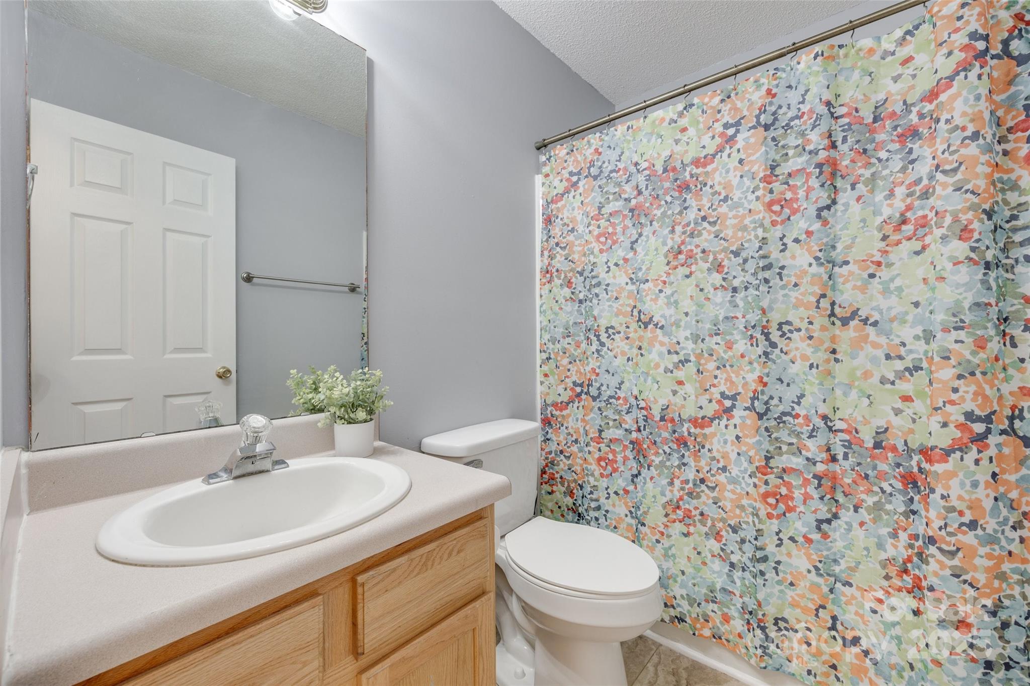 110 8th Street York, SC 29745 - Photo 19 of 26 a bathroom with a sink and a toilet