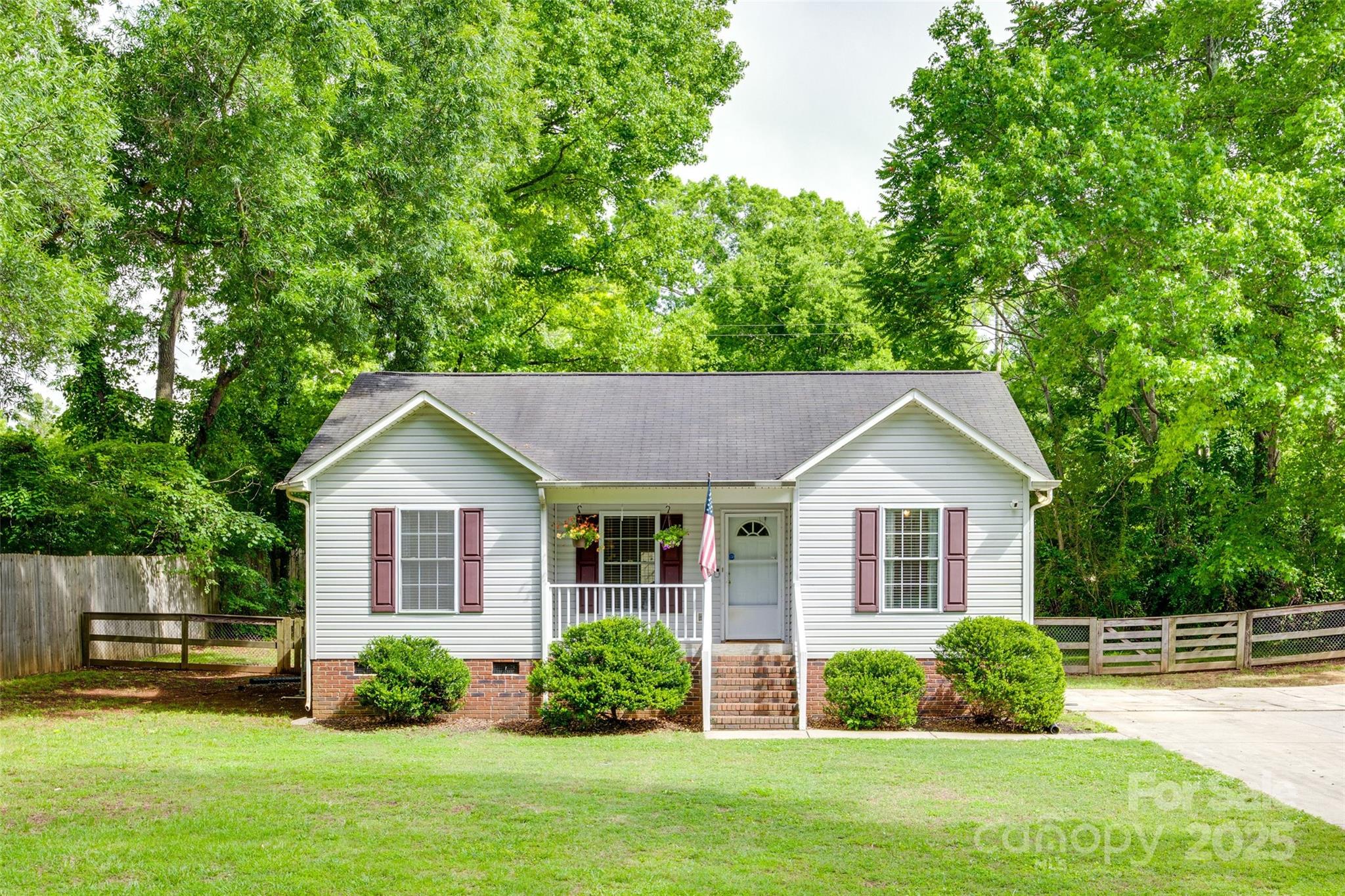 110 8th Street York, SC 29745 - Photo 2 of 26 a view of a house with garden and plants