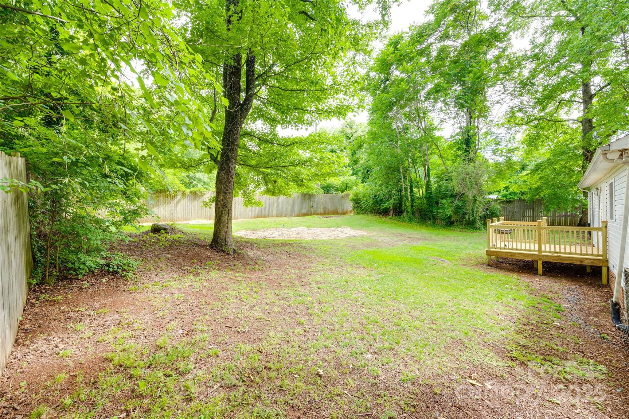 110 8th Street York, SC 29745 - Photo 25 of 26 a view of a backyard with a small cabin