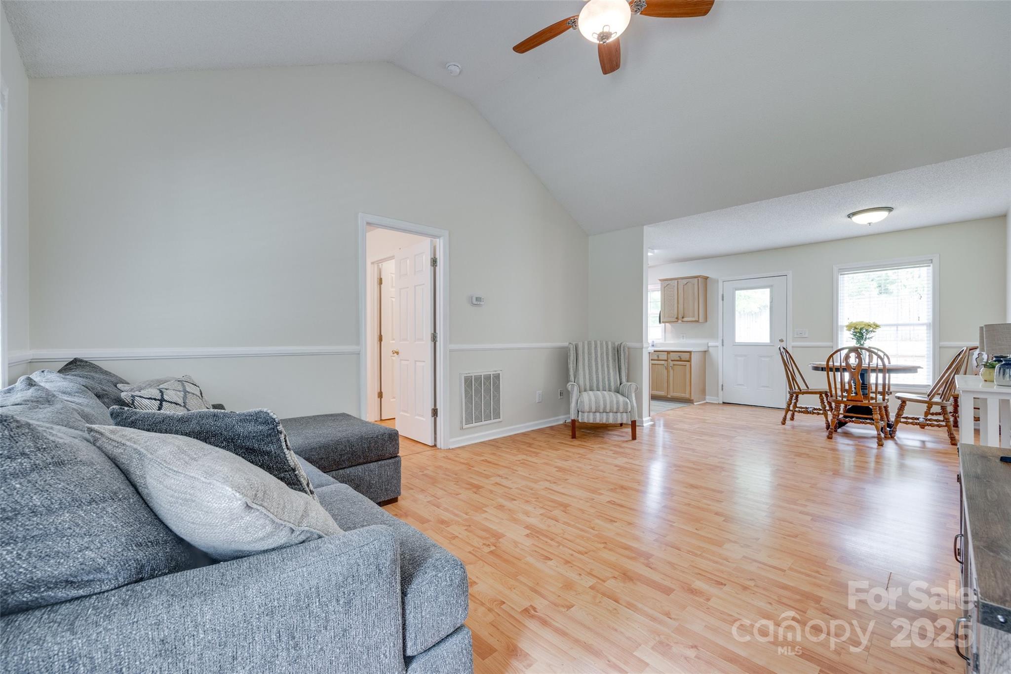 110 8th Street York, SC 29745 - Photo 6 of 26 a living room with furniture and a chandelier