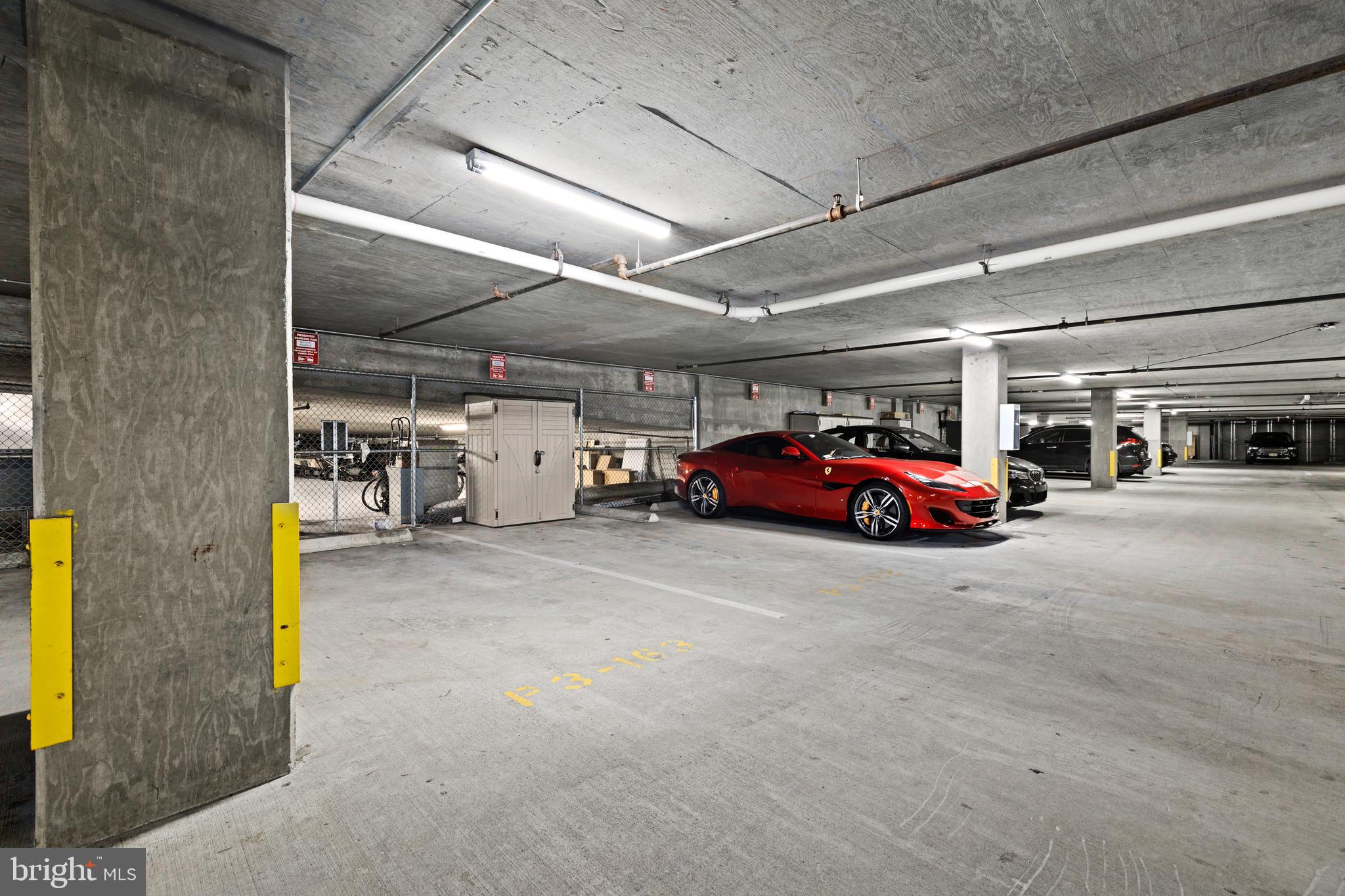 1025 First Street Southeast, Unit 611 Washington, DC 20003 - Photo 29 of 32 a view of parking garage with cars