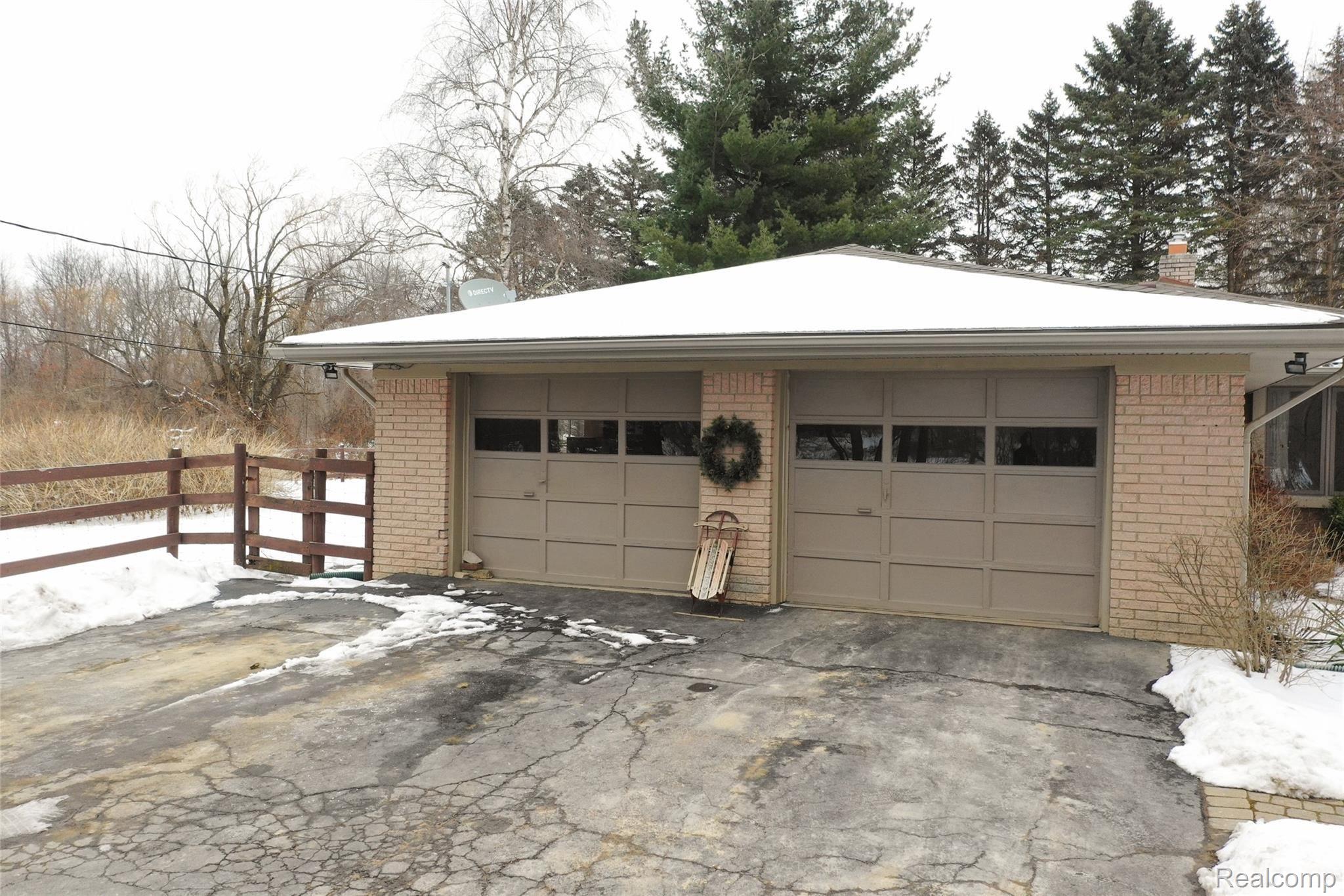 1600 Noble Road Leonard, MI 48367 - Photo 39 of 59 Over-sized 2.5 car garage