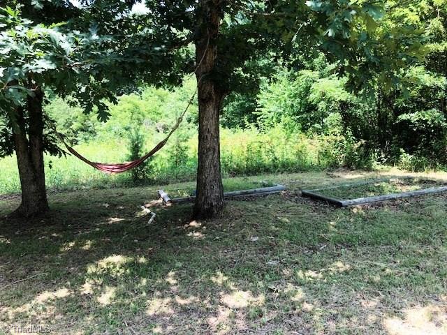 1170 Deer Chase Road Madison, NC 27025 - Photo 28 of 28 Two "perfect for a hammock" oak trees & 2 raised-bed garden spots!