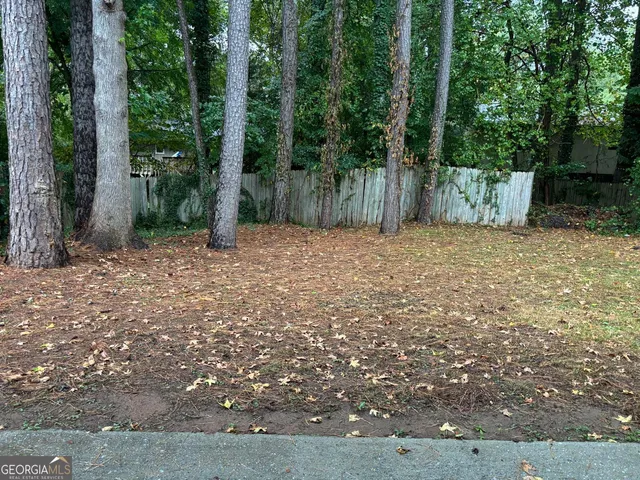 a house with trees in front of it