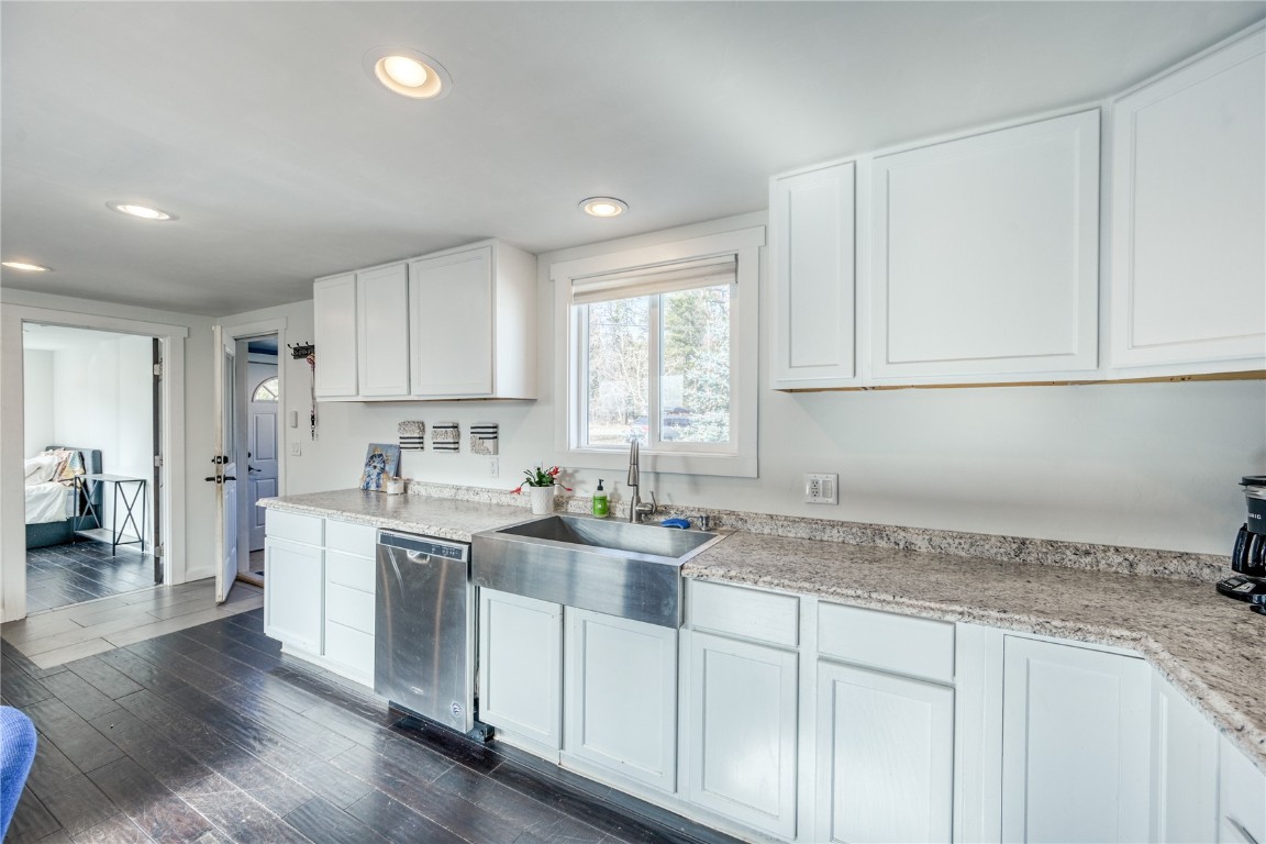 847 Airport Road, Unit 14 Breckenridge, CO 80424 - Photo 2 of 27 a kitchen with a sink a window and cabinets