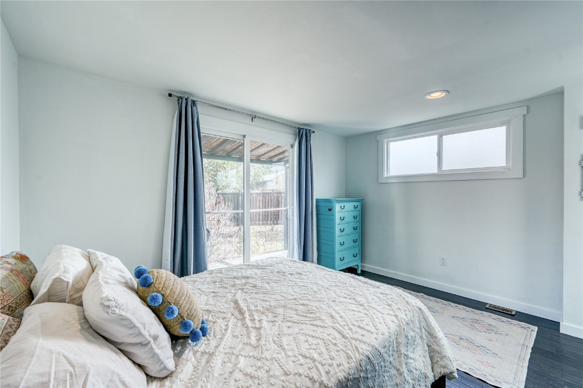847 Airport Road, Unit 14 Breckenridge, CO 80424 - Photo 21 of 27 a bedroom with a bed and a window