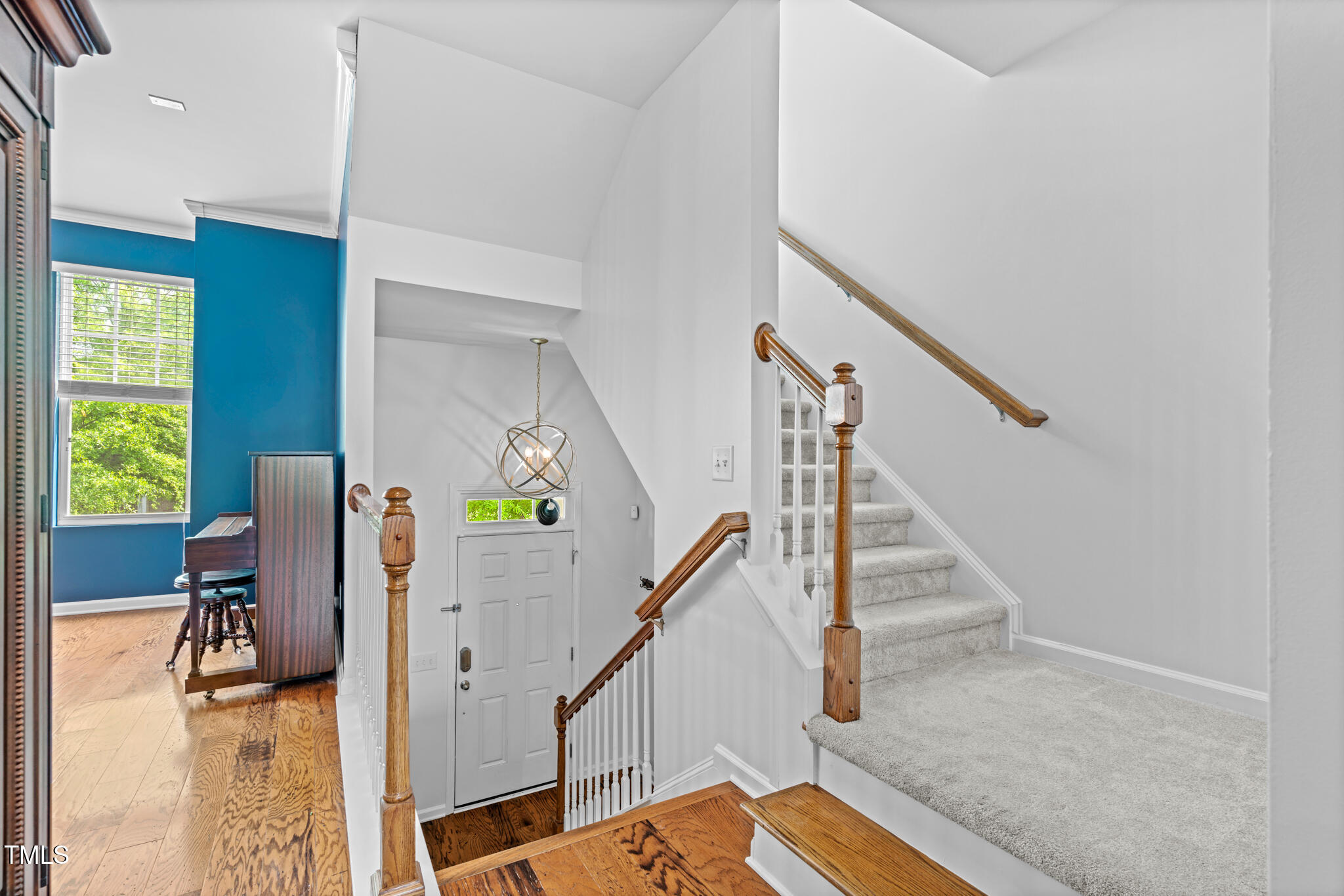 9105 Falkwood Road Raleigh, NC 27617 - Photo 5 of 31 Entryway and staircase leading upstairs