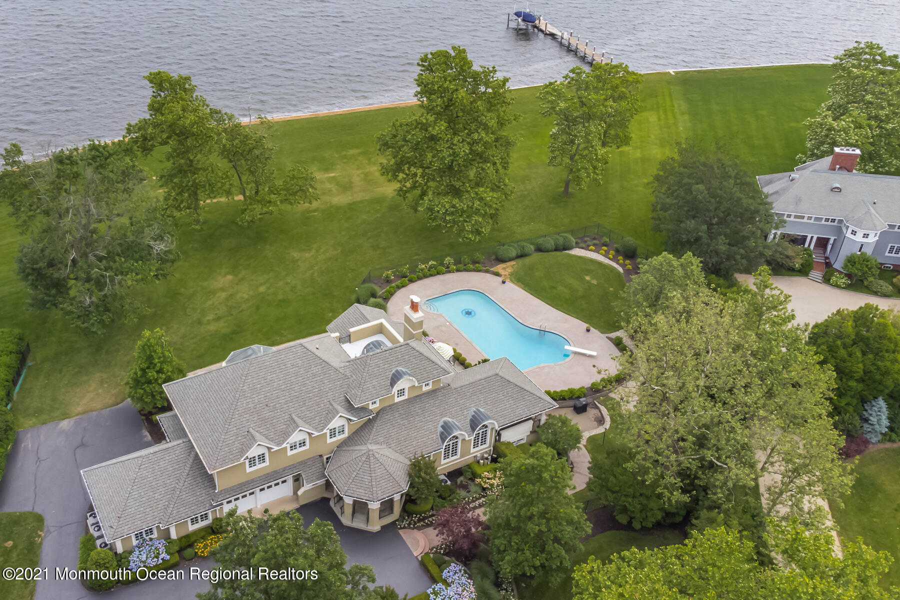 100 Goose Neck Point Road Oceanport, NJ 07757 - Photo 2 of 49 an aerial view of a house with a garden