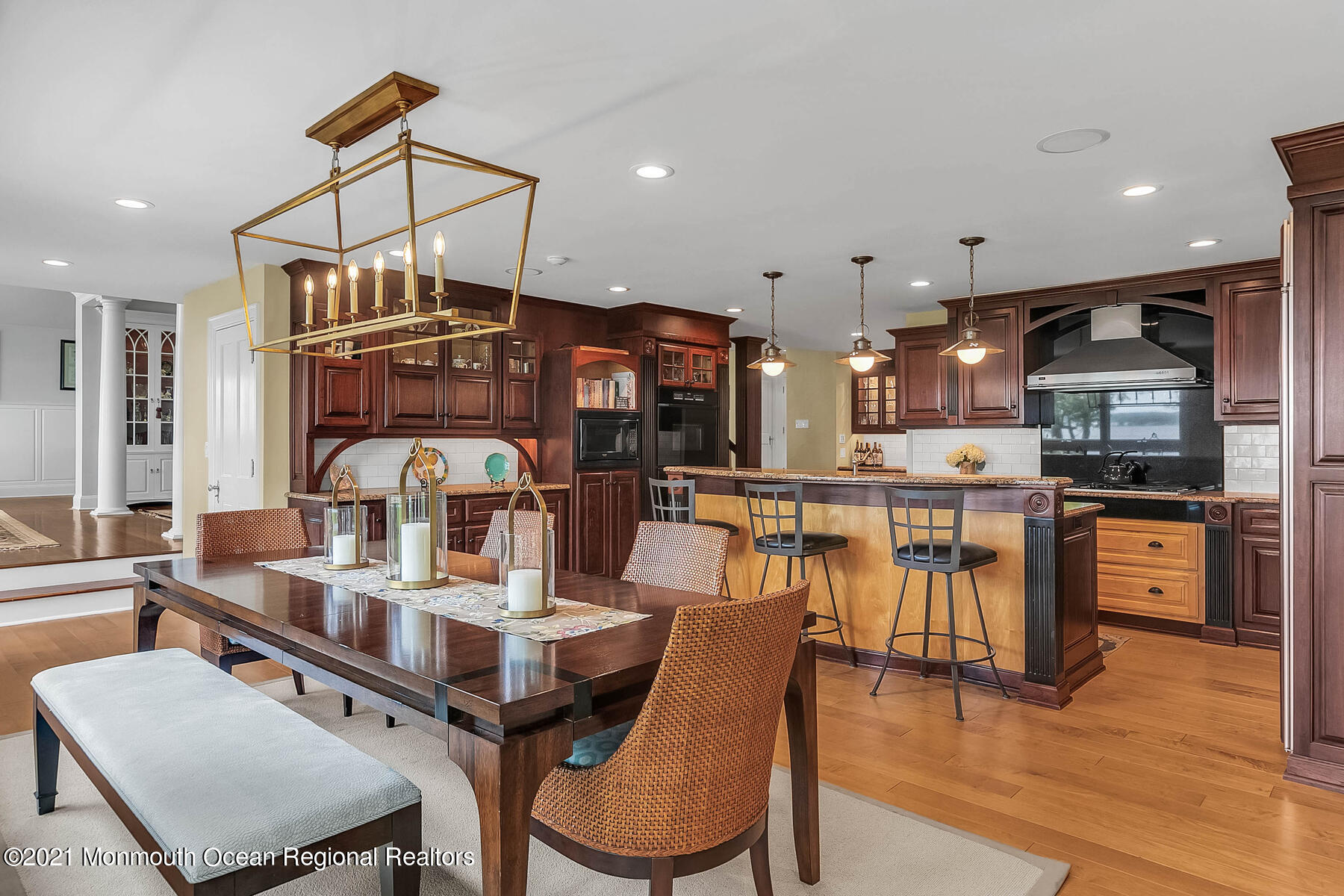 100 Goose Neck Point Road Oceanport, NJ 07757 - Photo 14 of 49 a large kitchen with a table and chairs