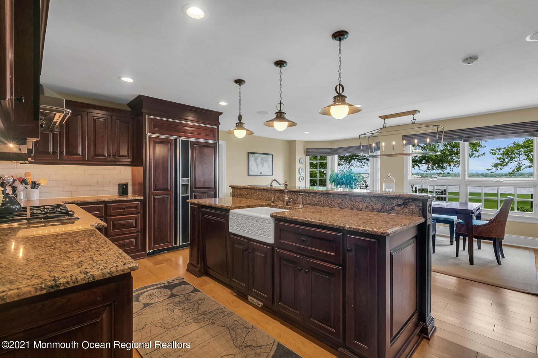 100 Goose Neck Point Road Oceanport, NJ 07757 - Photo 15 of 49 a kitchen with stainless steel appliances granite countertop a stove and a refrigerator