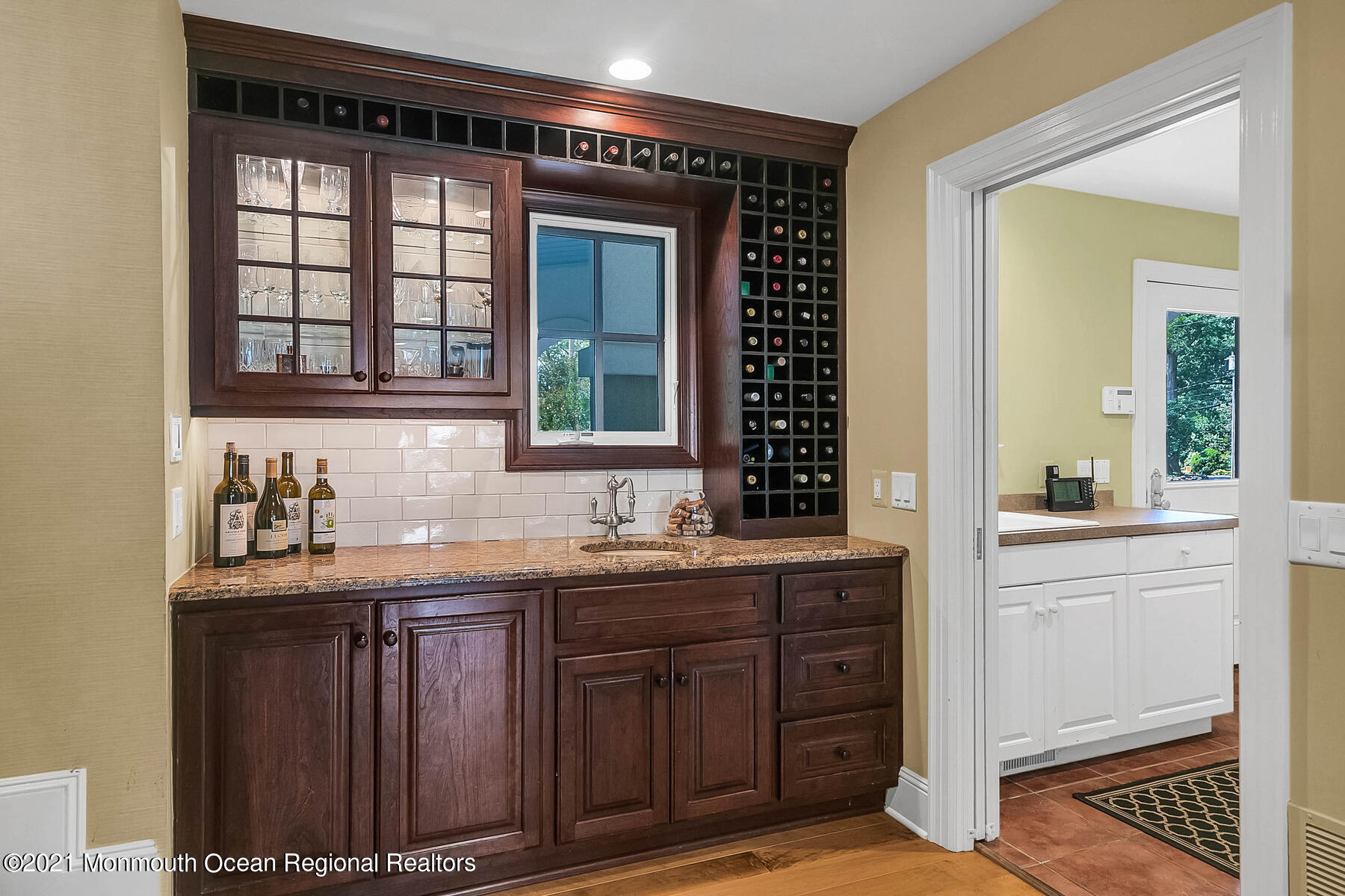 100 Goose Neck Point Road Oceanport, NJ 07757 - Photo 18 of 49 a kitchen with a sink and cabinets
