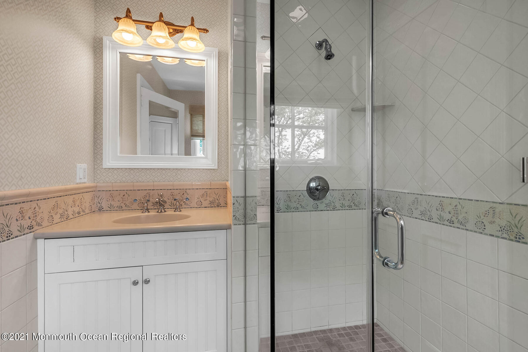 100 Goose Neck Point Road Oceanport, NJ 07757 - Photo 27 of 49 a bathroom with a granite countertop sink a mirror and shower