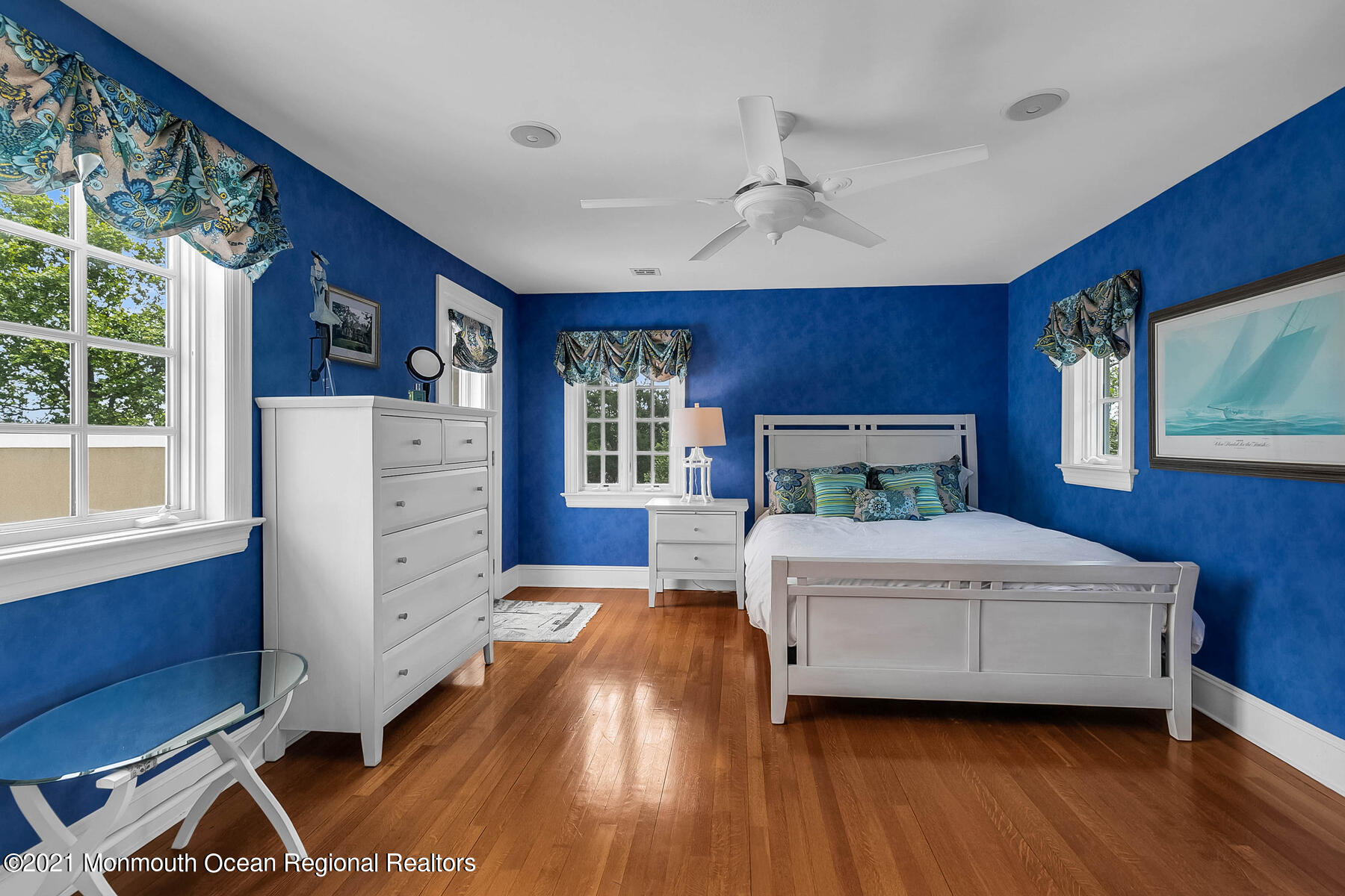 100 Goose Neck Point Road Oceanport, NJ 07757 - Photo 29 of 49 a bedroom with a bed wooden floor and window