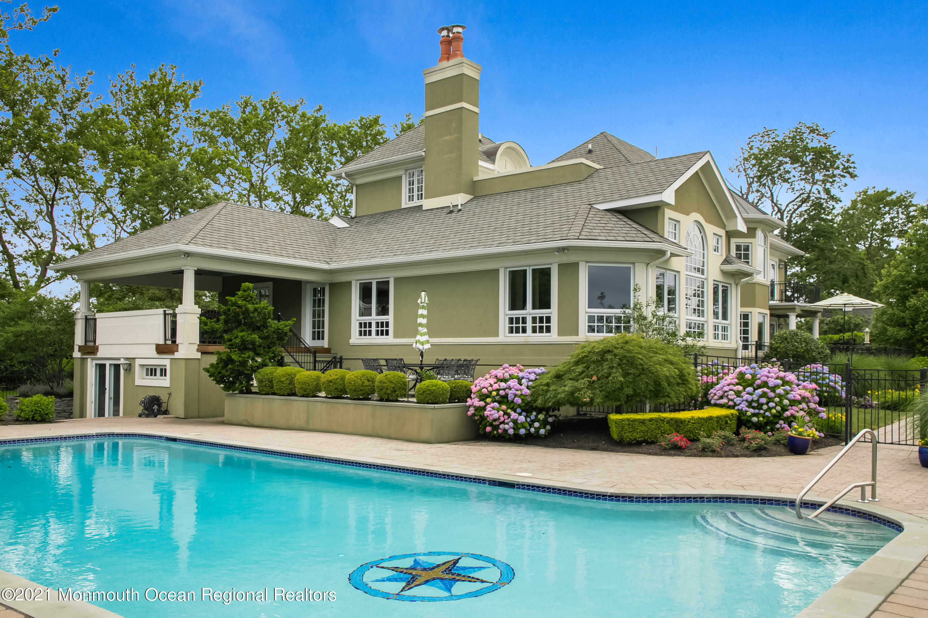 100 Goose Neck Point Road Oceanport, NJ 07757 - Photo 32 of 49 a front view of a house with a yard