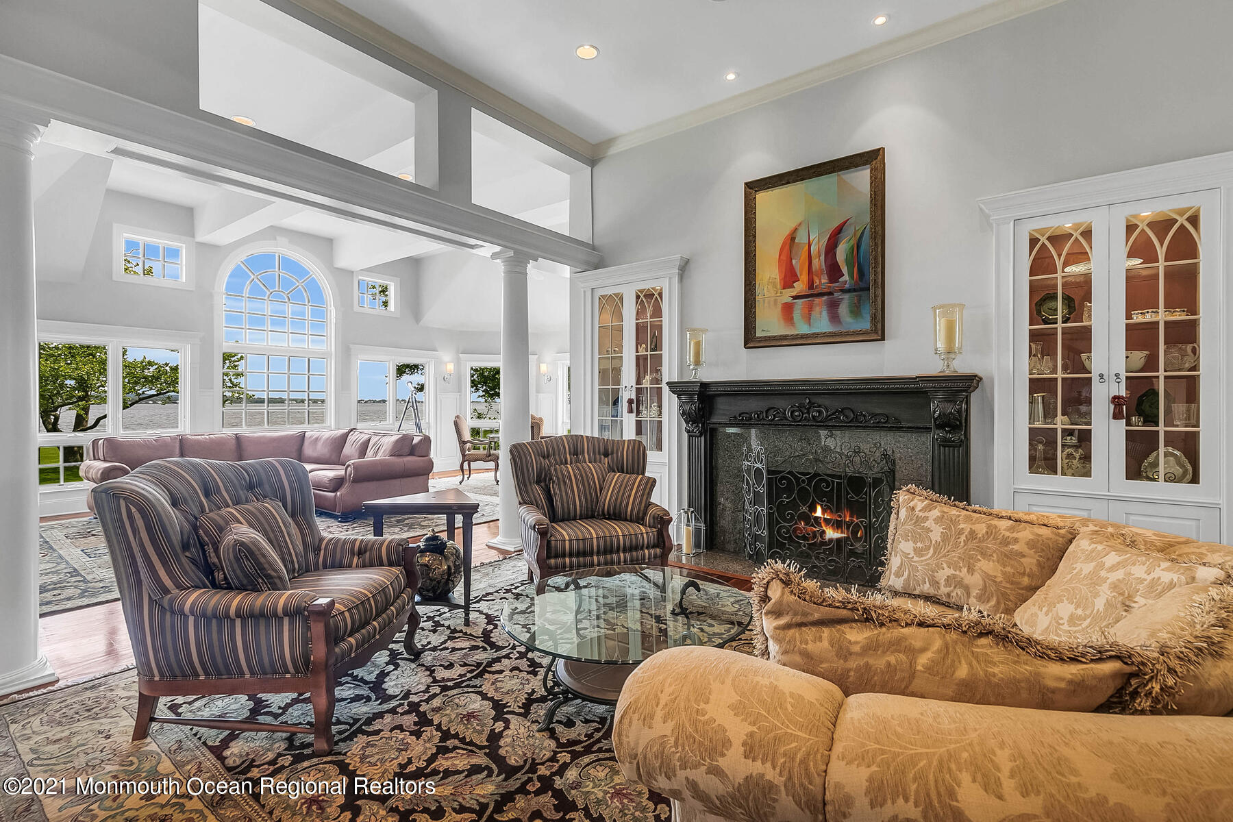 100 Goose Neck Point Road Oceanport, NJ 07757 - Photo 5 of 49 a living room with furniture large window and a fireplace