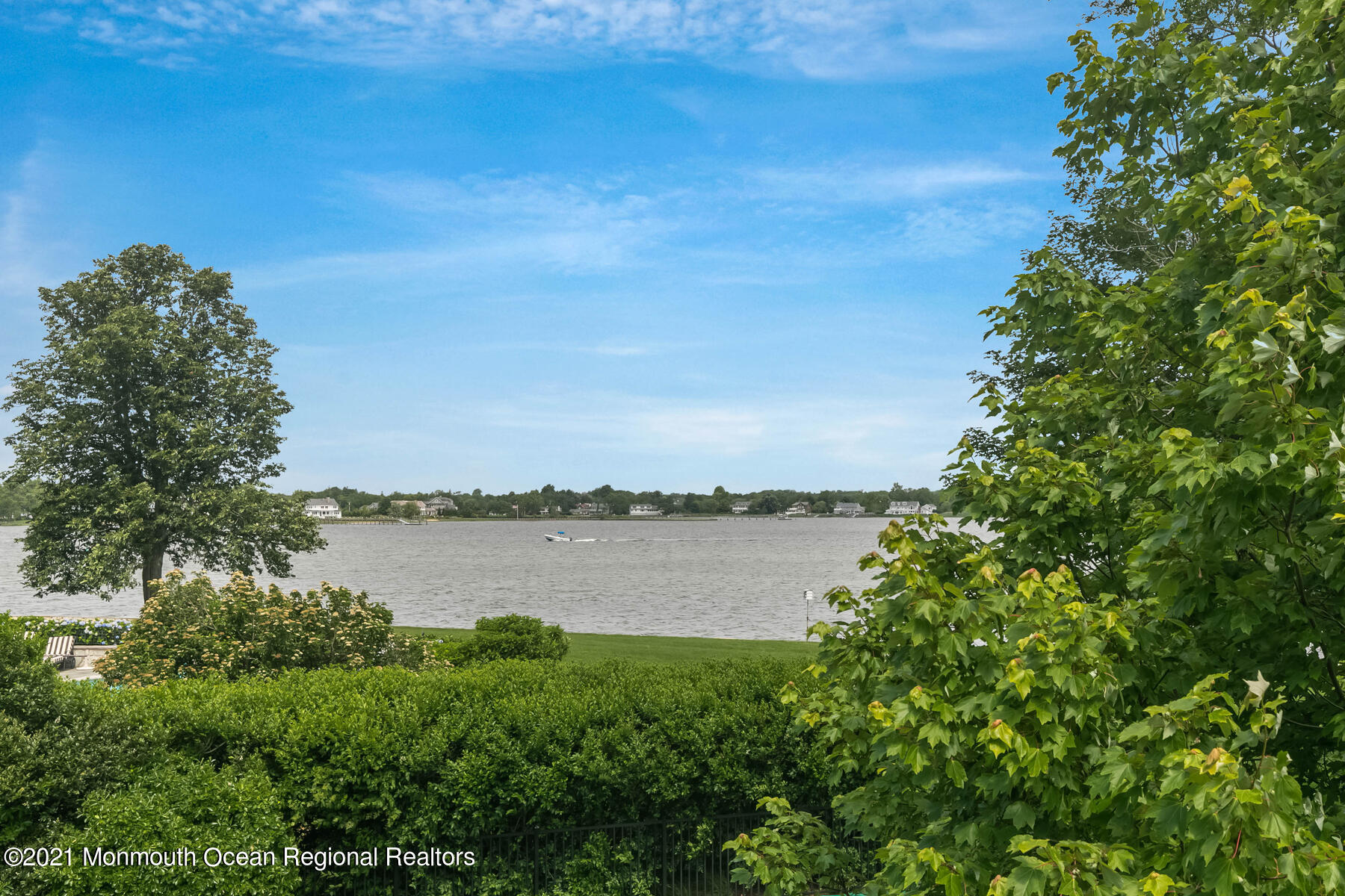 100 Goose Neck Point Road Oceanport, NJ 07757 - Photo 43 of 49 a view of a lake from a yard