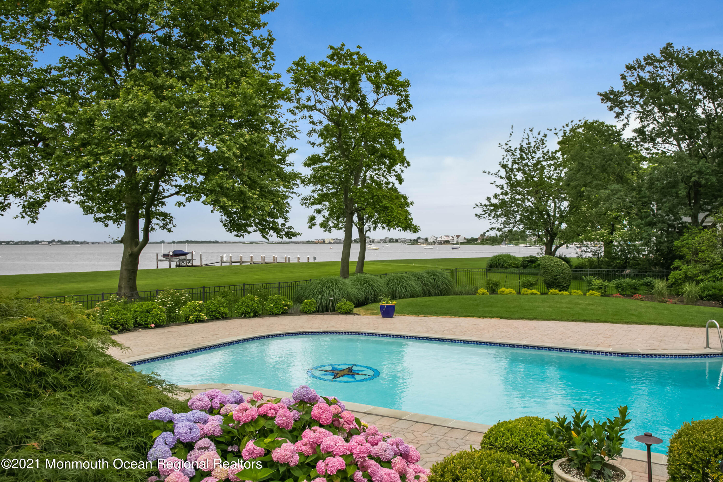 100 Goose Neck Point Road Oceanport, NJ 07757 - Photo 46 of 49 an aerial view of a garden