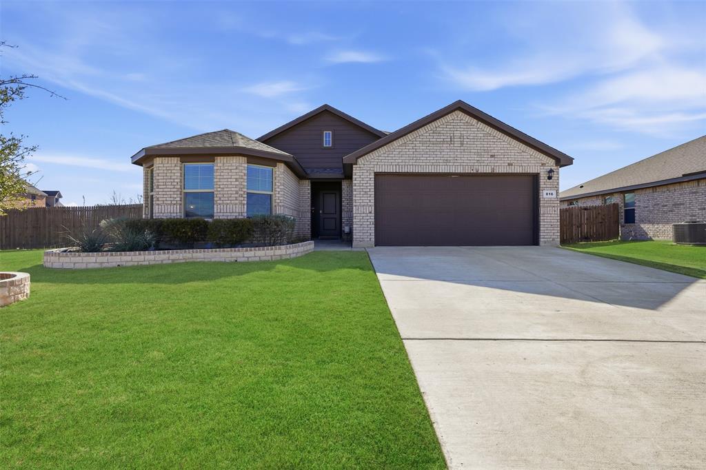816 Durango Lane Cleburne, TX 76033 - Photo 1 of 16 a front view of house with yard and green space