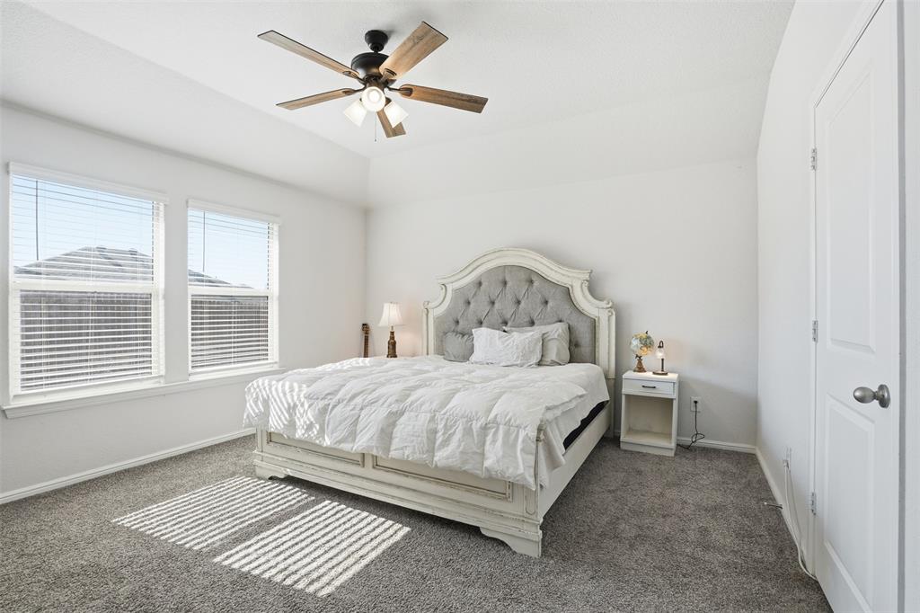 816 Durango Lane Cleburne, TX 76033 - Photo 11 of 16 a bedroom with a bed and a window