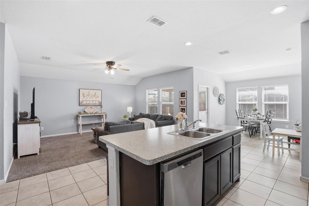 816 Durango Lane Cleburne, TX 76033 - Photo 4 of 16 a kitchen with a sink and living room