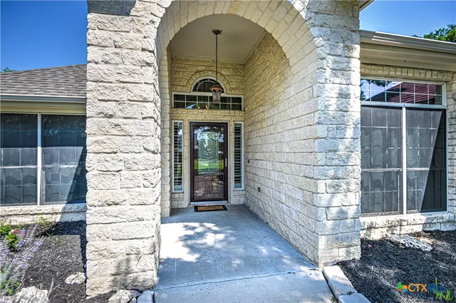 a brick building with a door