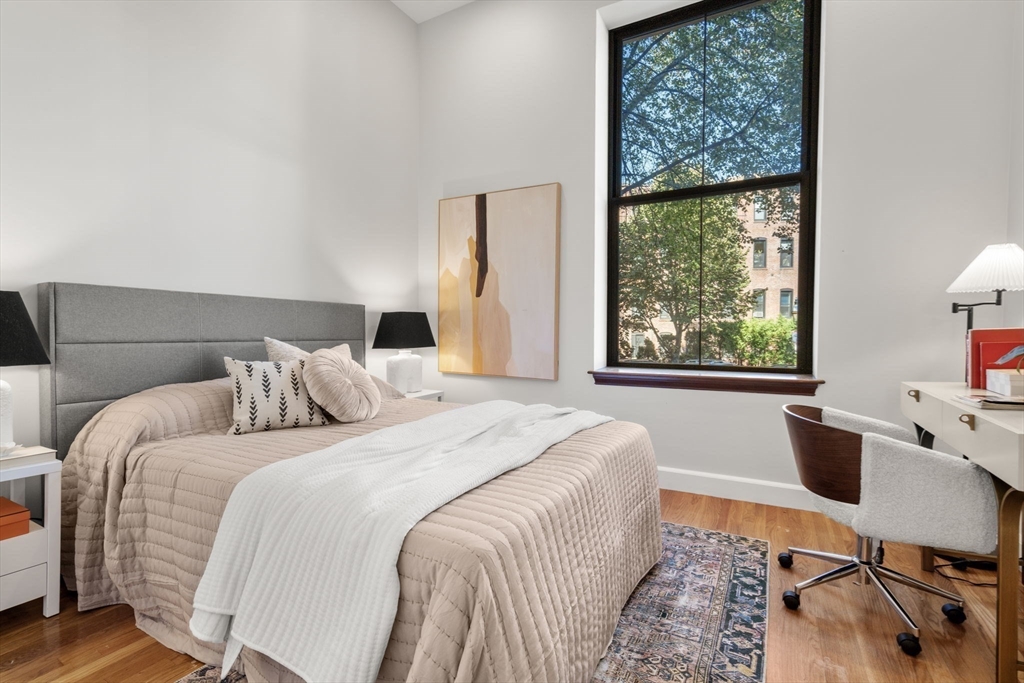 150 Appleton Street, Unit 2A Boston, MA 02116 - Photo 11 of 24 a bedroom with a bed and a desk