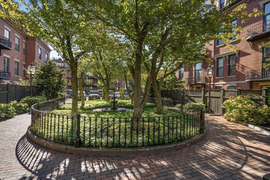 150 Appleton Street, Unit 2A Boston, MA 02116 - Photo 18 of 24 a outdoor view of a house with a garden