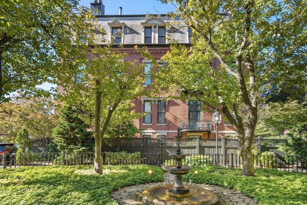 150 Appleton Street, Unit 2A Boston, MA 02116 - Photo 20 of 24 a front view of a house with garden