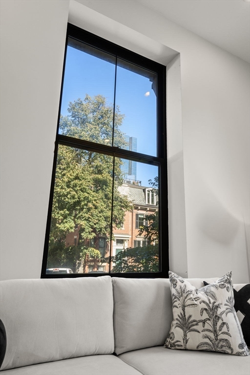 150 Appleton Street, Unit 2A Boston, MA 02116 - Photo 3 of 24 a living room with a large window