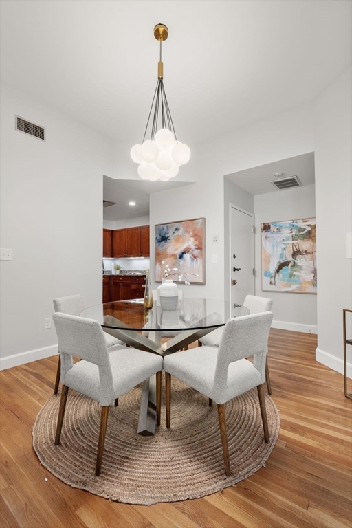 150 Appleton Street, Unit 2A Boston, MA 02116 - Photo 4 of 24 a living room with furniture and a table