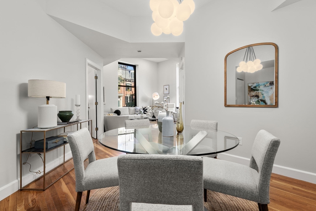 150 Appleton Street, Unit 2A Boston, MA 02116 - Photo 5 of 24 a dining room with furniture and wooden floor