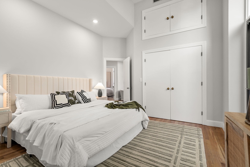 150 Appleton Street, Unit 2A Boston, MA 02116 - Photo 8 of 24 a bedroom with a bed and a night stand