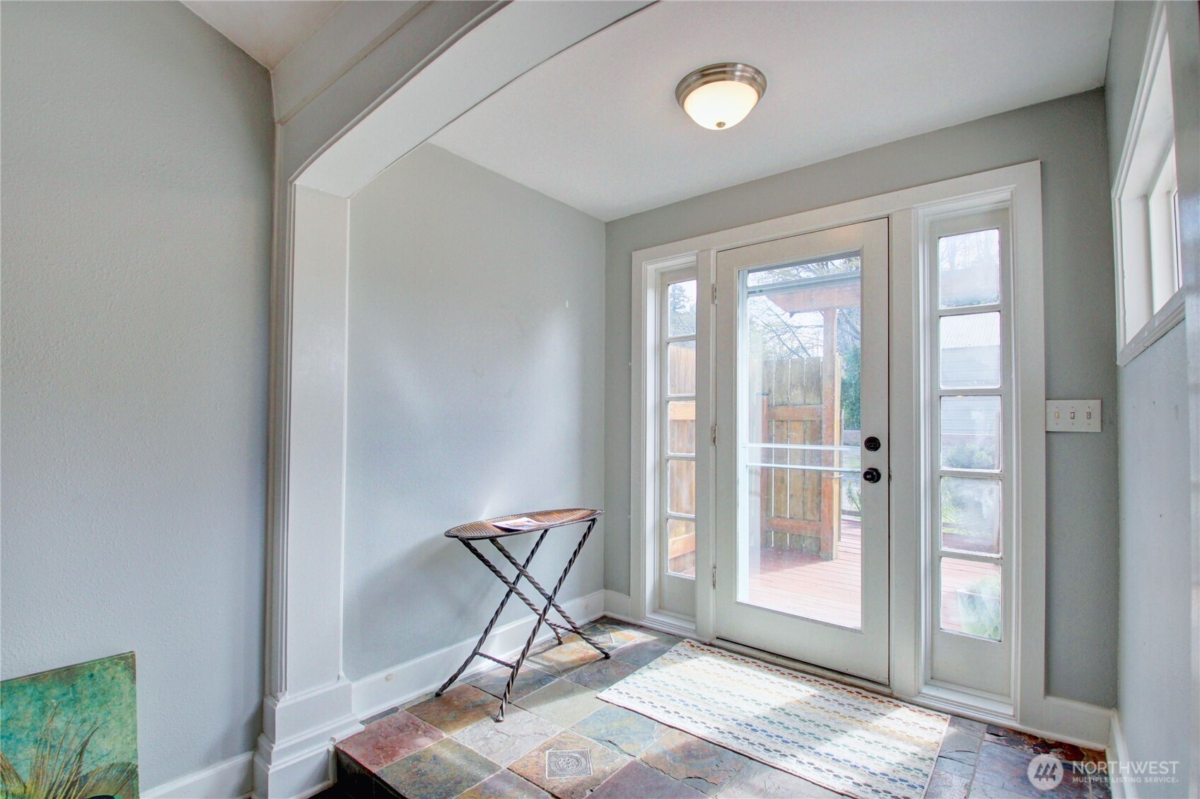 818 Serene View Road Camano Island, WA 98282 - Photo 13 of 39 a view of a room with furniture and windows
