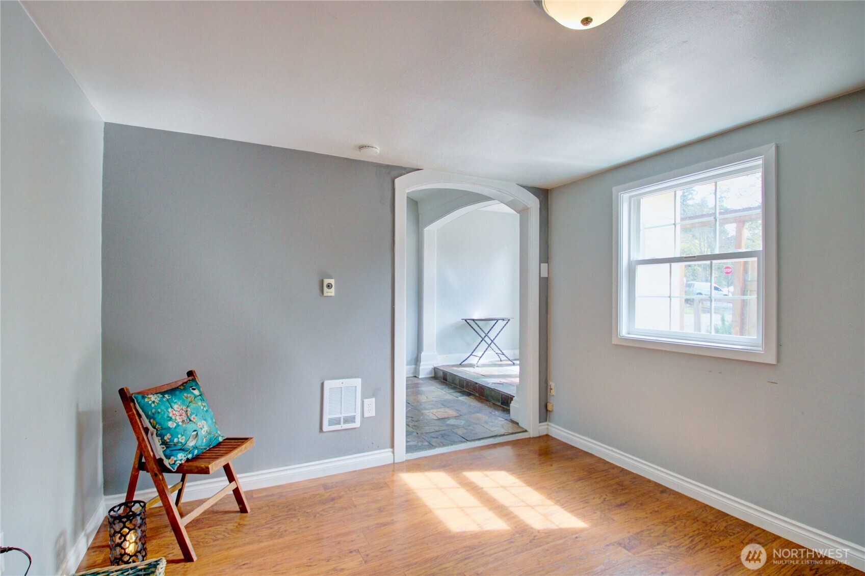 818 Serene View Road Camano Island, WA 98282 - Photo 16 of 39 a view of an empty room and a window
