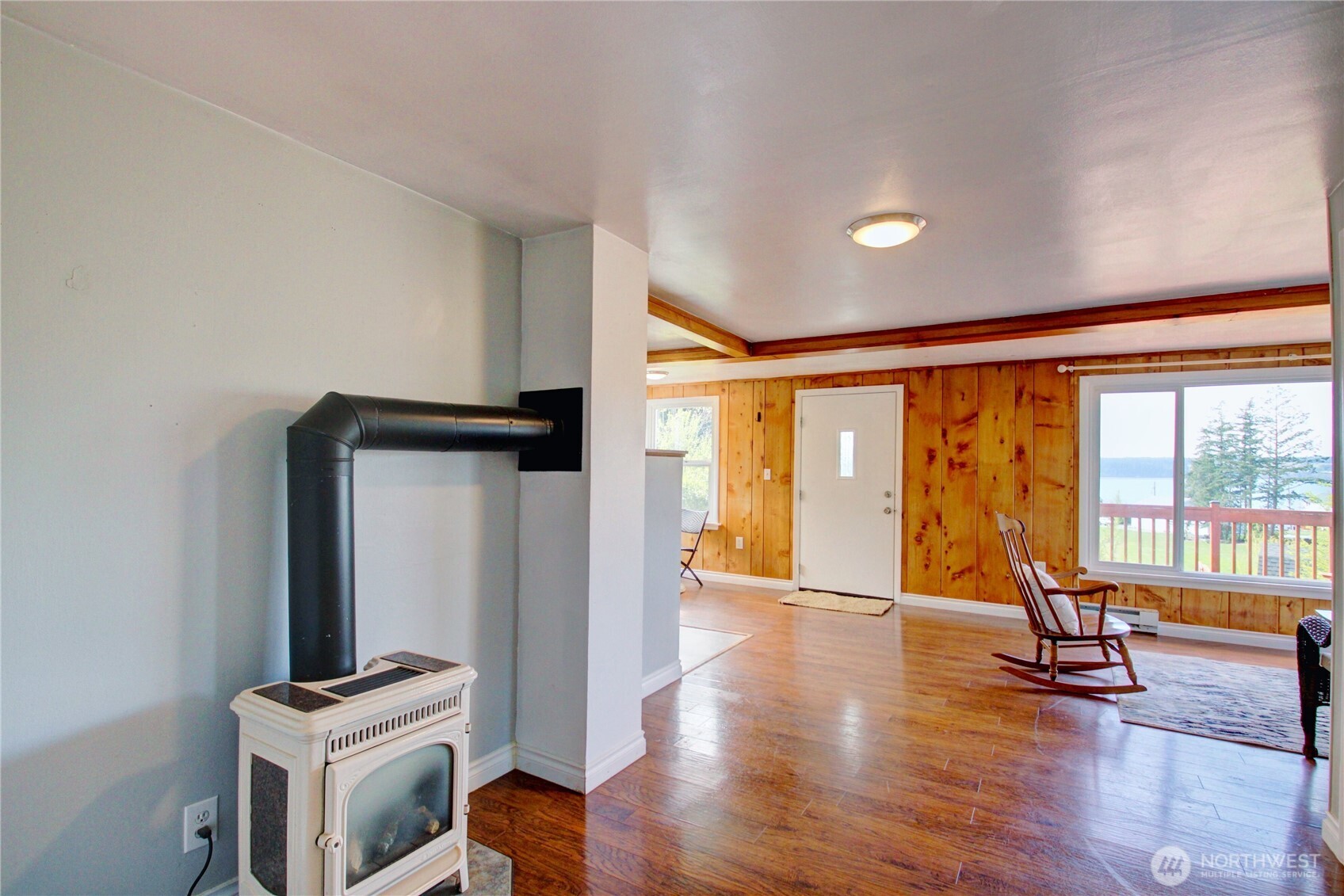 818 Serene View Road Camano Island, WA 98282 - Photo 27 of 39 a view of a room with wooden floor and furniture