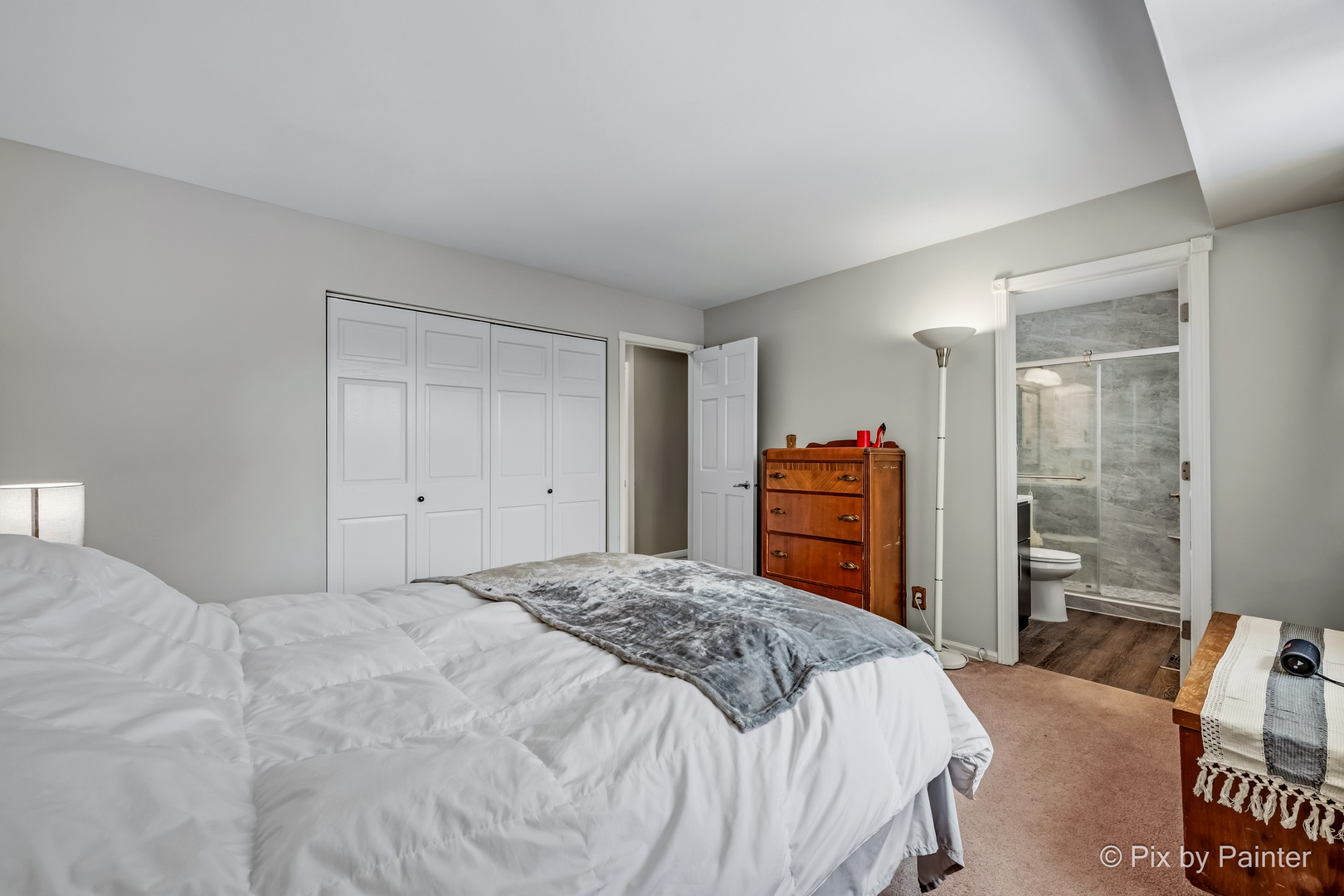 730 Chestnut Court Algonquin, IL 60102 - Photo 27 of 36 a bedroom with a bed and a dresser in it
