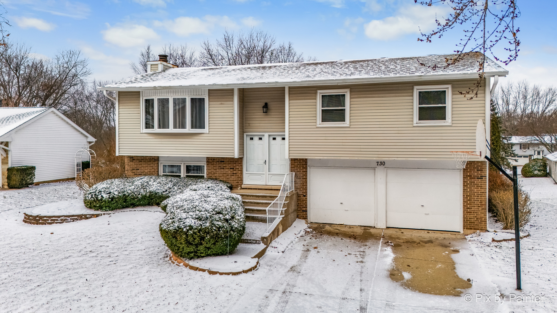 730 Chestnut Court Algonquin, IL 60102 - Photo 3 of 36 a view of a house with a yard and potted plants