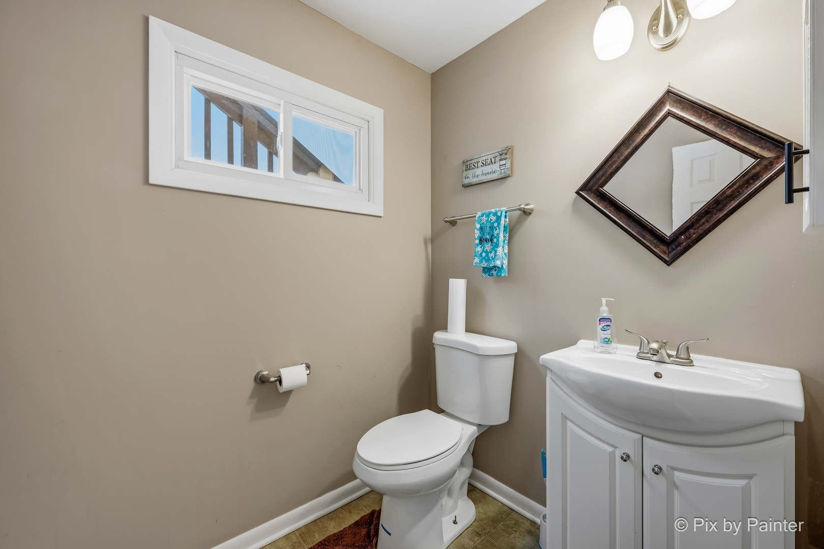 730 Chestnut Court Algonquin, IL 60102 - Photo 35 of 36 a bathroom with a toilet sink and mirror